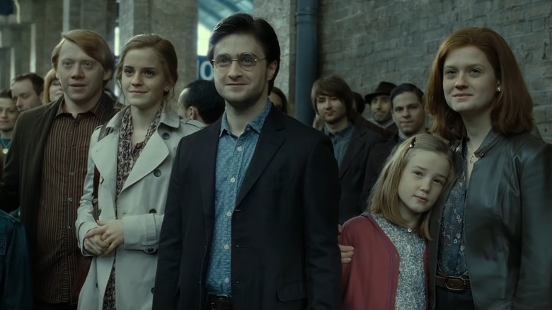 Harry and his friends watching the Hogwarts Express depart