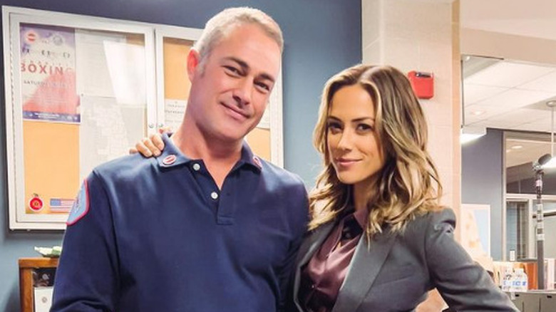 Jana Kramer and Taylor Kinney posing