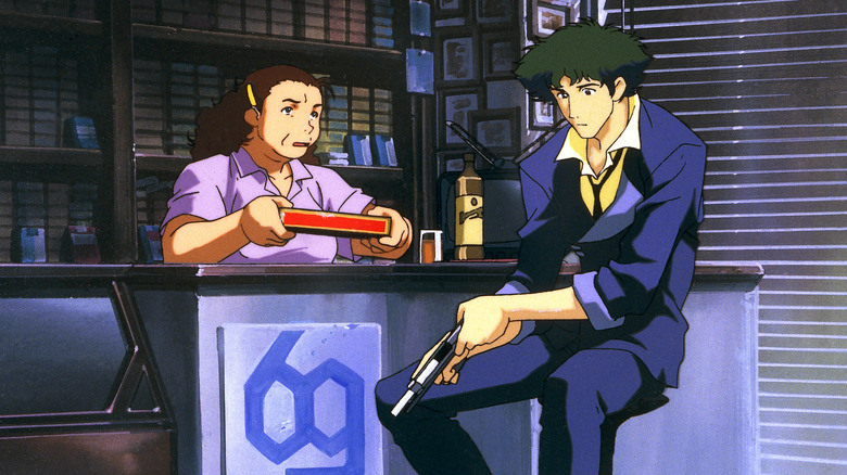 Spike Spiegel loads gun while talking to Annie on Cowboy Bebop