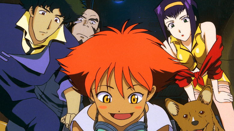 Spike, Jet, and Faye looking over Ed's shoulder on Cowboy Bebop