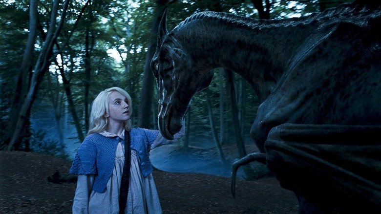 Luna pets a thestral