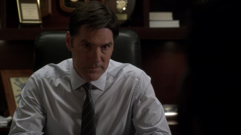 Hotch sitting at his desk