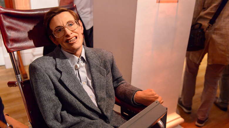 Stephen Hawking smiling in wheelchair