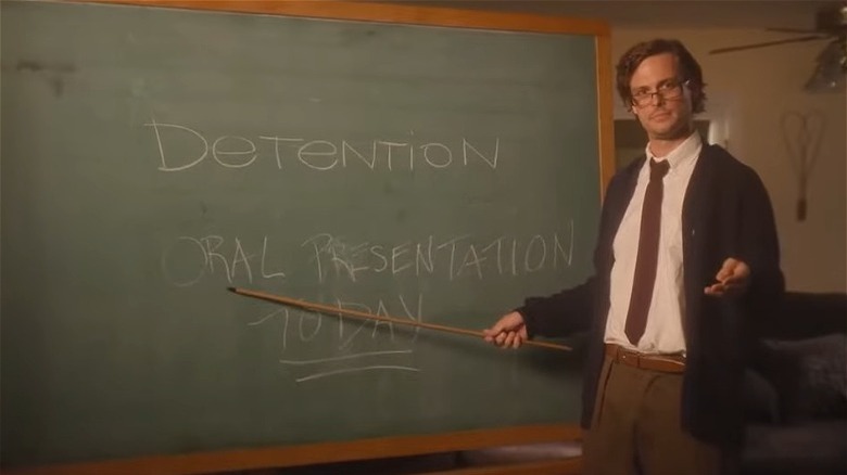 Matthew Gray Gubler pointing at a chalkboard