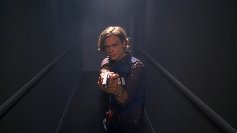 Spencer Reid aiming gun