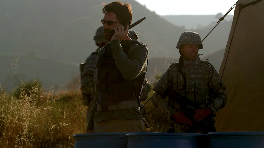 Thomas Gibson Hotch cell phone military tent desert