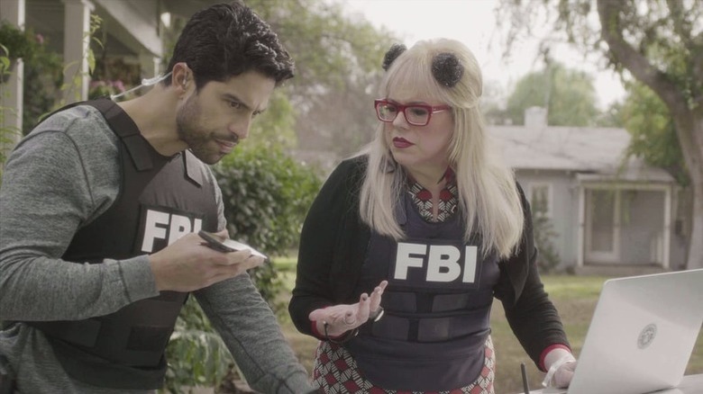 Penelope Luke working FBI vests