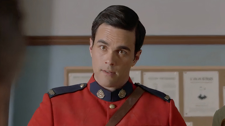 Gabriel Kinslow wearing red Mountie uniform