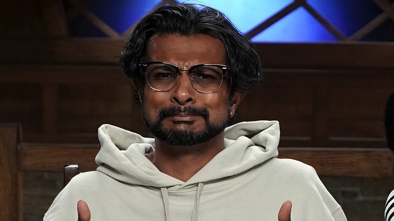 Utkarsh Ambudkar wears a white hoodie