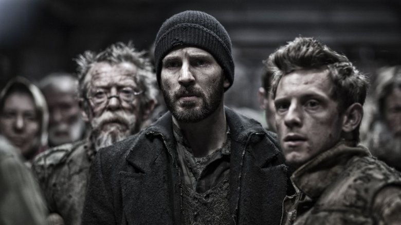 "John Hurt, Chris Evans and Jamie Bell in Snowpiercer"