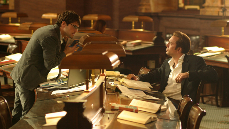 Riley and Gates argue in a library in "National Treasure" (2004)