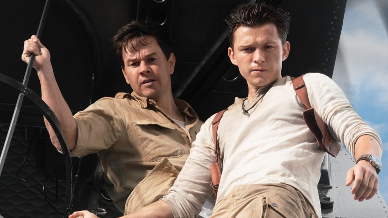 Sully and Nate standing together in "Uncharted"