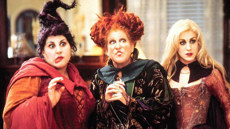 The Sanderson sisters preparing mischief