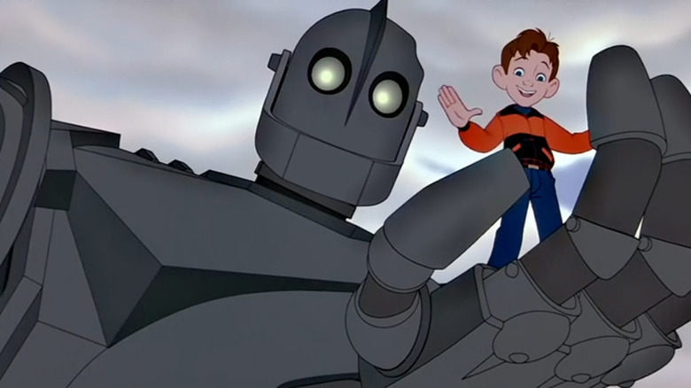 The Iron Giant holding Hogarth Hughes