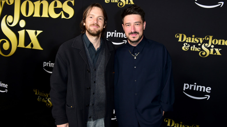 Blake Mills and Marcus Mumford pose at event 