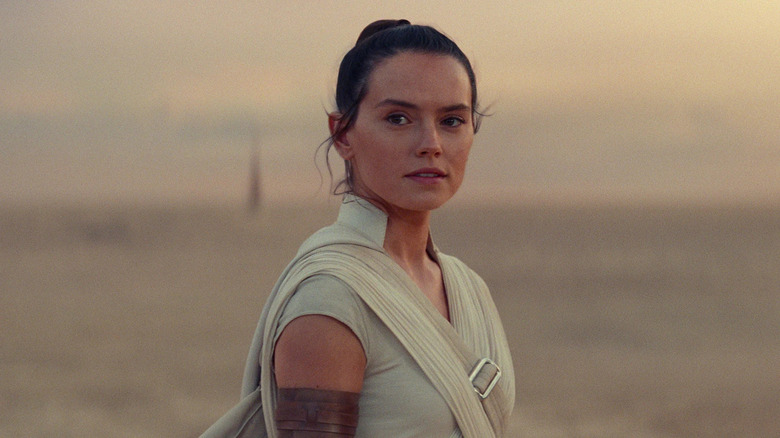 Daisy Ridley as Rey smiling