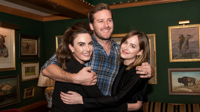 Elizabeth Chambers, Armie Hammer and Dakota Johnson attend the Audi Q7 Holiday and Snow Polo Celebration on December 19, 2015 in Aspen, Colorado