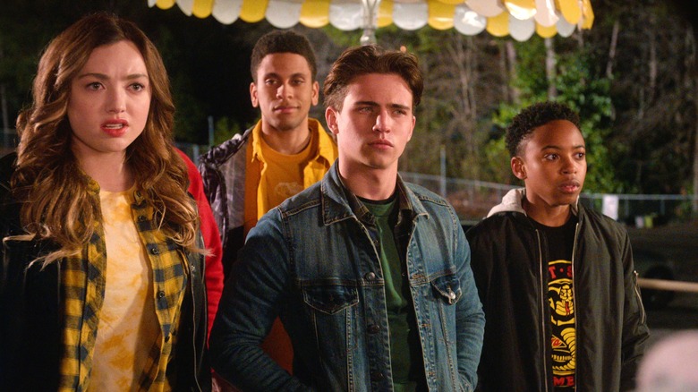 Peyton List, Tanner Buchanan, and Dallas Dupree Young looking concerned