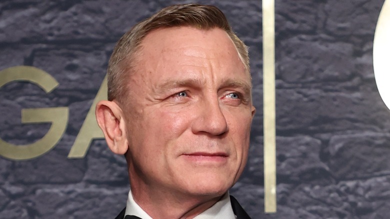 Daniel Craig smiling at an event