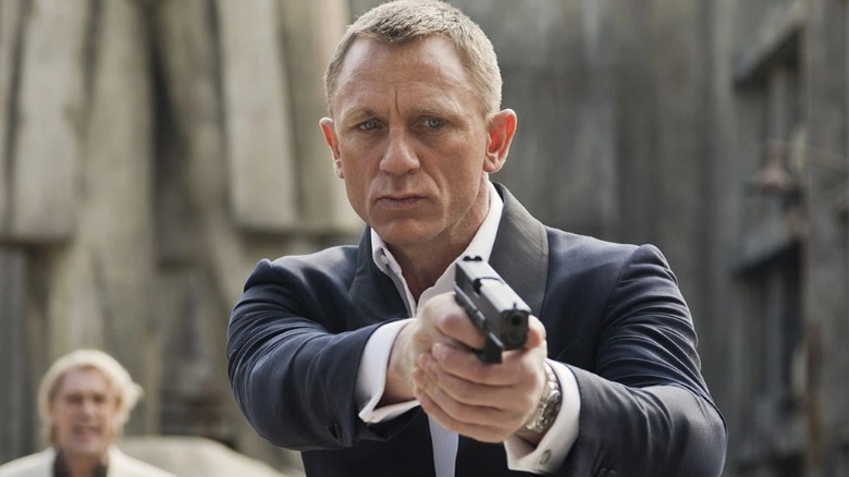 James Bond aiming a gun 