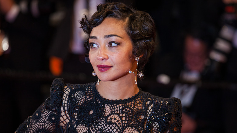 Ruth Negga black lace dress at event