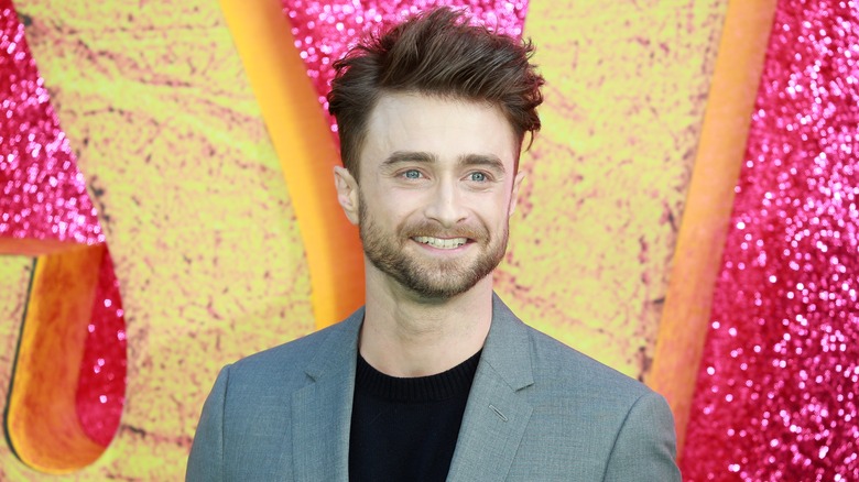 Daniel Radcliffe smiling on red carpet