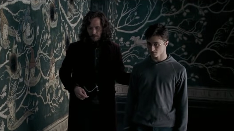 Gary Oldman and Daniel Radcliffe walking and talking