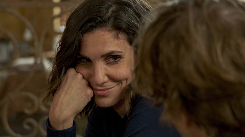 Kensi smiling at Deeks