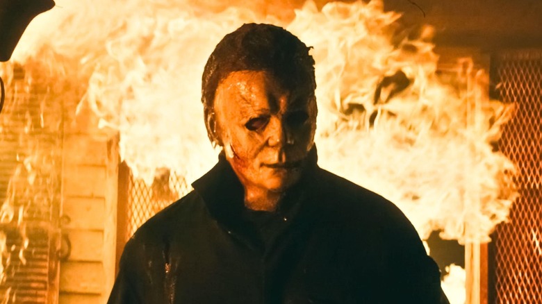 Michael Myers walking away from explosion in Halloween Kills