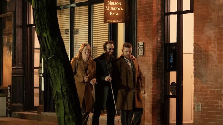 Karen, Matt, and Foggy walking on a sidewalk after work (2025)