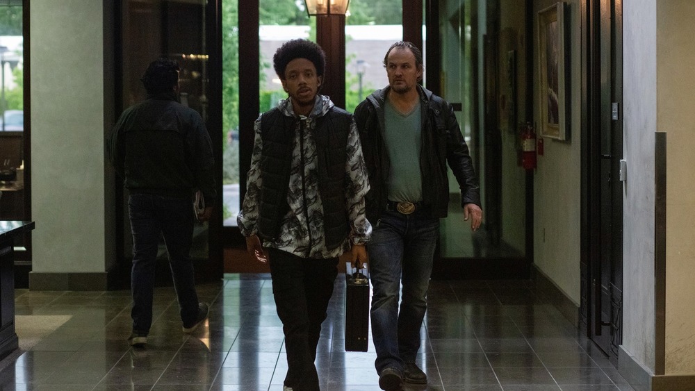 Darrell Britt-Gibson as Rayford and Jason Clarke as Rick Bowden in the crime thriller film, SILK ROAD, a Lionsgate release. 