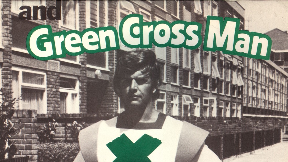 David Prowse dressed as the Green Cross Man