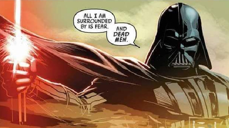 Darth Vader holding his lightsaber and talking
