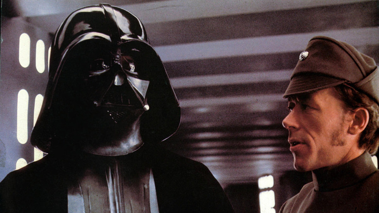 Darth Vader talking to Captain Needa aboard an Imperial vessel