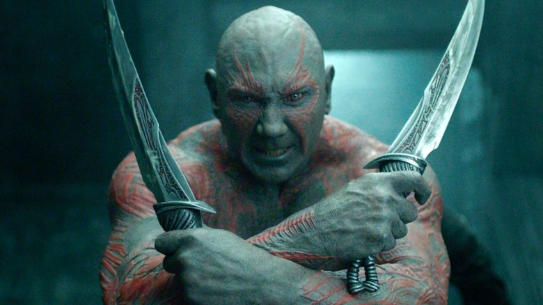 Drax holding his knives