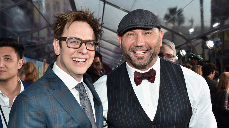 James Gunn and Dave Bautista smiling 