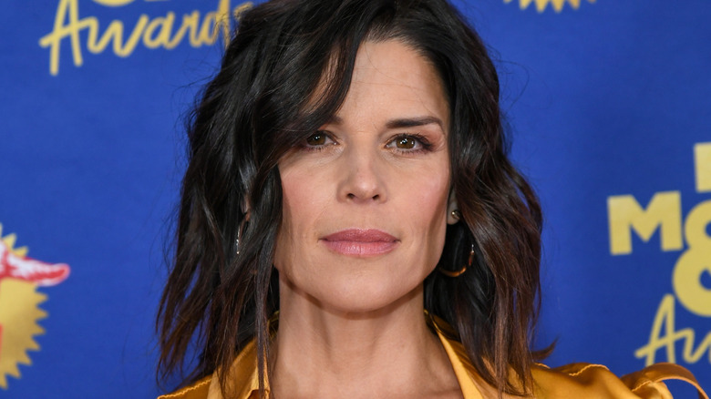 Neve Campbell posing on the red carpet