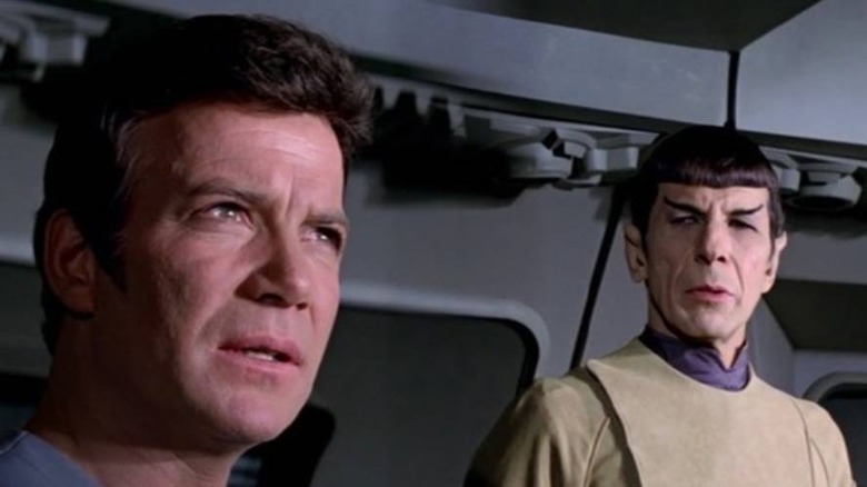 Captain Kirk talking with Spock