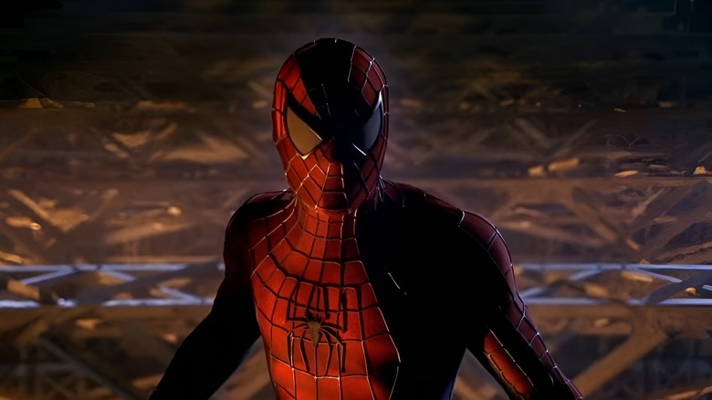 Spider-Man standing in shadows