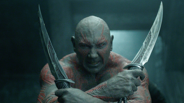 Drax holding knives