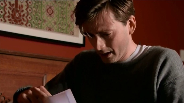 Dave reading a letter