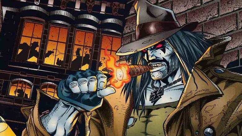 Lobo lights a cigar