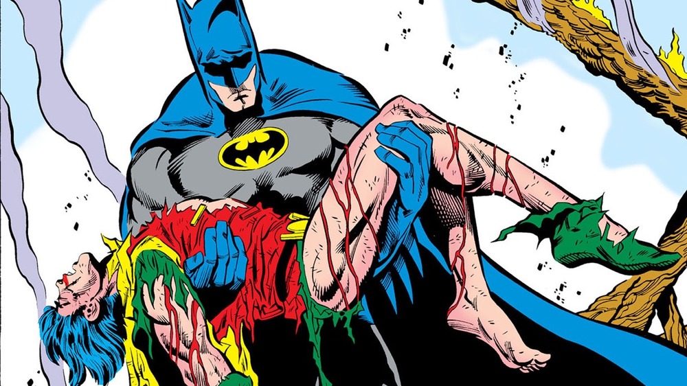 Batman carrying Jason Todd's body