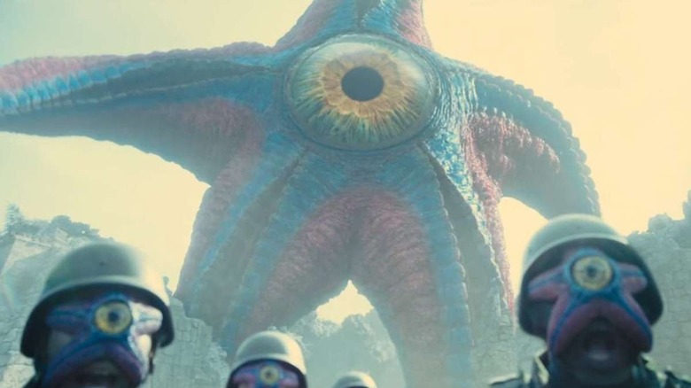 Starro looming over their army