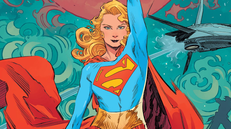 Supergirl raises arm