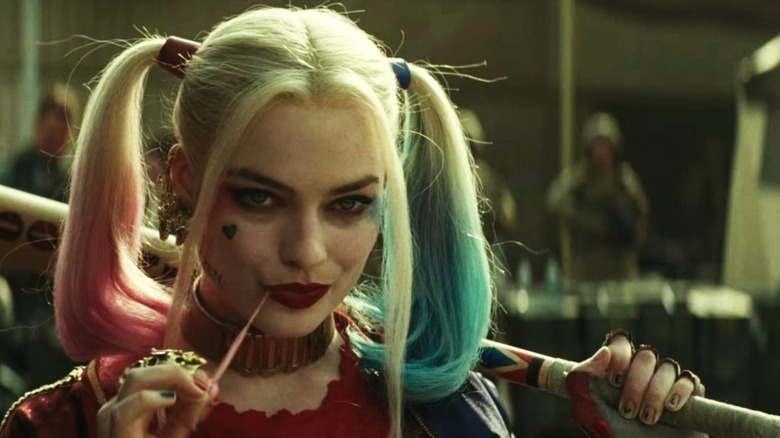 Harley Quinn engaging in some scheming