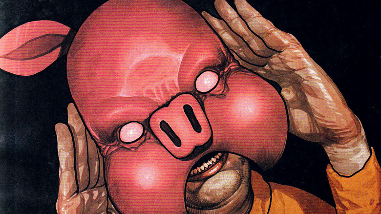 Pyg putting on his mask