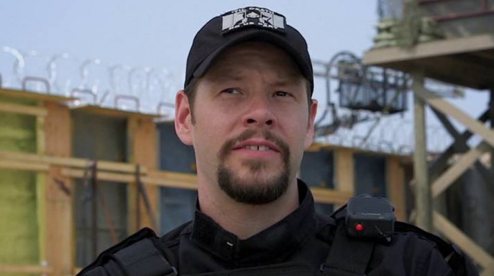 Ike Barinholtz as Hunter Griggs in Suicide Squad