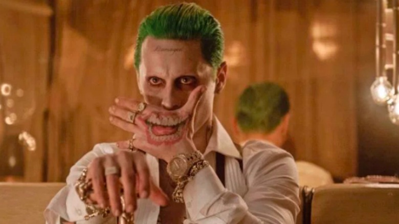 Joker showing hand tattoo