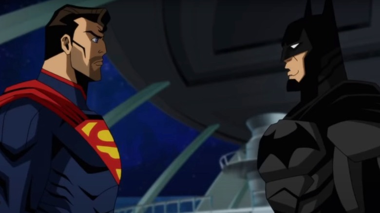 Superman talking to Batman